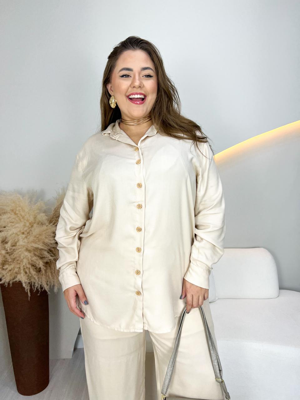 Calça pantalona de viscose sarjada com elástico na cintura